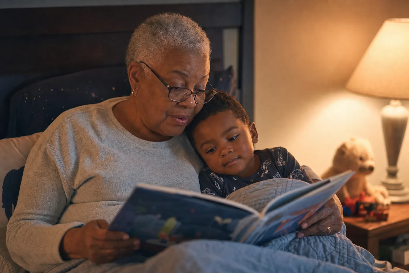 A grandmother and her grandson reading their AlreadyLoved book together at bedtime